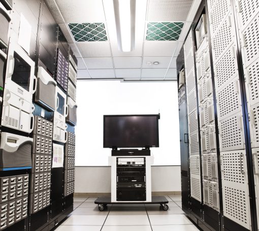 Storage racks aligned in a computer server room.